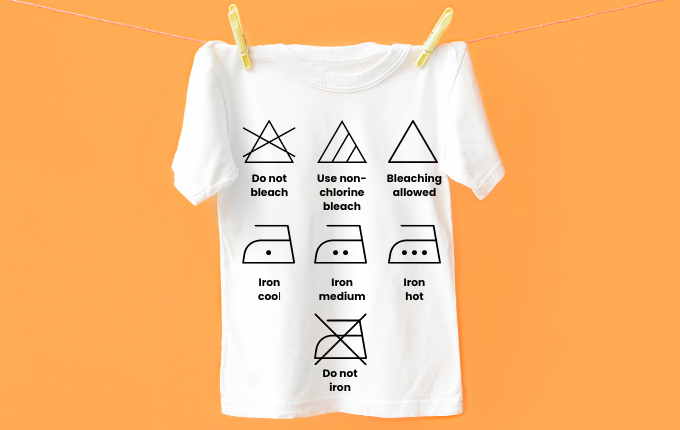 Laundry care symbols on a white t-shirt.