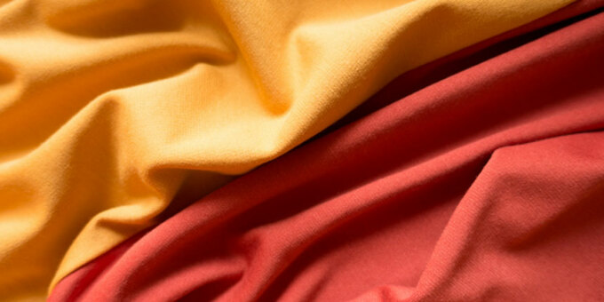 Yellow and red polyester fabric.